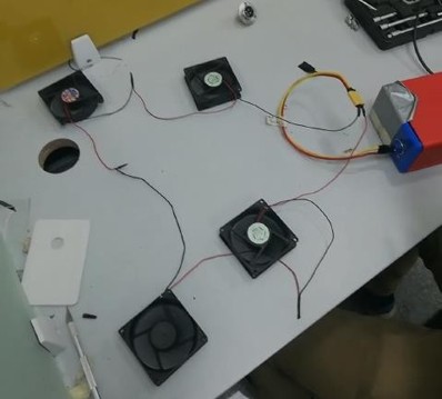 Custom HV battery discharging circuit using CPU fans in series